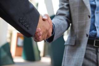 Business people shaking hands